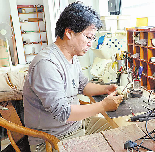 裂痕之上,匠心绽放生机.jpg 裂痕之上,匠心绽放生机.jpg